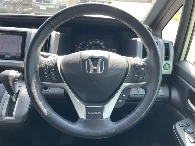 ホンダ ステップワゴン スパーダ Z 福岡県 2014(平26)年 9万km ホワイトオーキッドパール 社外7型ナビ（（ワンセグ/DISC/AM/FM/SD/iPod)/Bカメラ/両側パワースライドドア/クルーズコントロール/LEDヘッドライト/オートライト/社外16インチAW/アイドリングストップ/パドルシフト/横滑り防止装置/盗難防止装置/ドアバイザー/純正フロアマット/スマートキー/ETC/保証書/取扱説明書