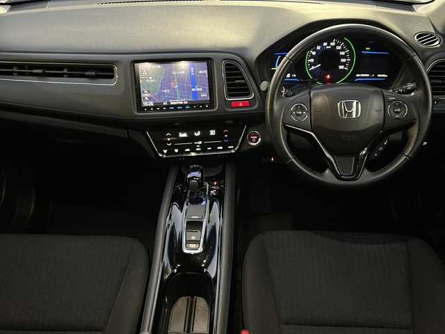 ホンダ ヴェゼル ハイブリッド X 東京都 2015(平27)年 9.7万km ホワイトオーキッドパール HDDナビ/バックカメラ/クルーズコントロール/パドルシフト/フルセグテレビ/BT/SD/CD/DVD/USB/AUX/HDMI/ETC/横滑り防止装置/純正アルミホイール/純正フロアマット/取扱説明書/保証書