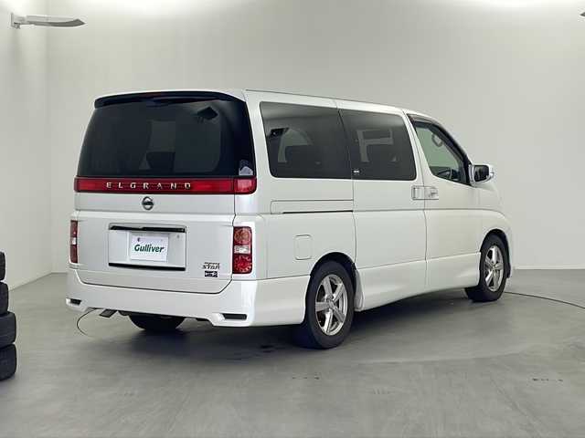 日産 エルグランド ハイウェイスター 栃木県 2005(平17)年 12.7万km 白 純正オーディオ/AM FM CD MD/片側パワースライドドア/AFS/オートエアコン/オートライト/ハーフレザーシート/ステアリングスイッチ/電動格納ミラー/社外16インチアルミホイール/純正フロアマット/ドアバイザー