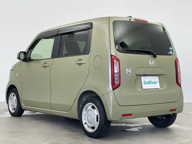 ホンダ Ｎ ＷＧＮ L ホンダセンシング 鹿児島県 2020(令2)年 0.9万km ガーデングリーンM ディスプレイオーディオ（Bluetooth・CD・USB）/バックカメラ/ホンダセンシング/ETC2.0/追従クルーズコントロール/レーンキープアシスト/後方コーナーセンサー/D席シートヒーター/LEDオートライト/オートマチックハイビーム/オートパーキングブレーキ/ブレーキホールド/アイドリングストップ/ステアリングスイッチ/スマートキー/スペアキー/純正フロアマット/純正１４インチアルミホイール