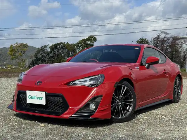 トヨタ ８６ GT 兵庫県 2014(平26)年 5.8万km ライトニングレッド HKSスーパーエキゾーストシステム/(エキゾーストマニホールド＆ハイパワースペックLマフラー)/VALENTIヘッドライト/TRDエアロ(F/S/RU)/D2ジャパンサスペンション/社外ナビ/フルセグTV/バックカメラ/純正18インチAW