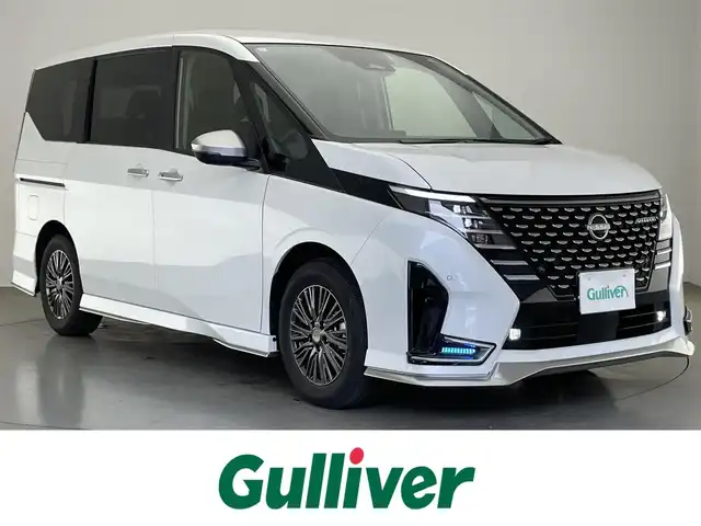 日産 セレナ オーテック 愛知県 2024(令6)年 0.9万km プリズムホワイト 純正１２．３型ナビ　日産コネクトナビゲーションシステム　フルセグＴＶ　ＨＤＭＩ　プロパイロット　全方位カメラ　ワイヤレス充電　前後シートヒーター　ステアリングヒーター　360度セーフティアシスト　エマージェンシーブレーキ　オーテックシート　ＬＥＤオートライト　衝突軽減　前後ドラレコ　ハンズフリー両側パワスラ　フォグランプ　コーナーセンサー　禁煙車
