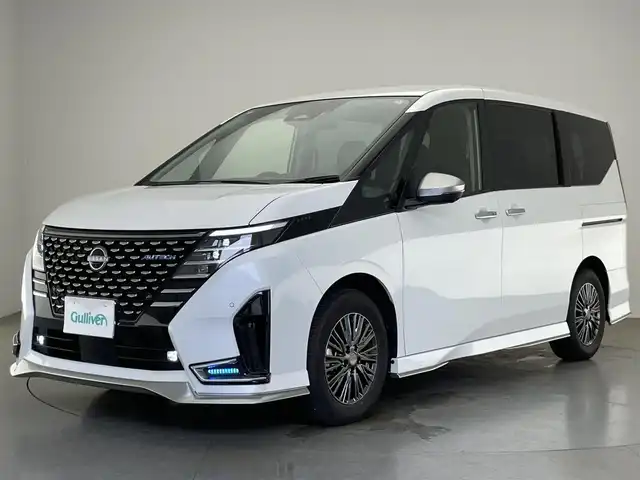 日産 セレナ オーテック 愛知県 2024(令6)年 0.9万km プリズムホワイト 純正１２．３型ナビ　日産コネクトナビゲーションシステム　フルセグＴＶ　ＨＤＭＩ　プロパイロット　全方位カメラ　ワイヤレス充電　前後シートヒーター　ステアリングヒーター　360度セーフティアシスト　エマージェンシーブレーキ　オーテックシート　ＬＥＤオートライト　衝突軽減　前後ドラレコ　ハンズフリー両側パワスラ　フォグランプ　コーナーセンサー　禁煙車