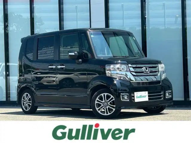 ホンダ Ｎ ＢＯＸ カスタム G SSパッケージ 大阪府 2017(平29)年 7.2万km クリスタルブラックパール 純正ナビ/   フルセグTV/CD/DVD/Bluetooth/バックモニター/横滑り防止装置/前席シートヒーター/両側パワースライドドア/アイドリングストップ/純正14インチアルミホイール/純正フロアマット/プッシュスタート/スマートキー/ＥＴＣ/三眼ＬＥＤ/禁煙車