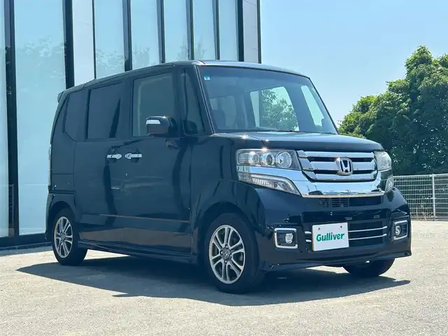 ホンダ Ｎ ＢＯＸ カスタム G SSパッケージ 大阪府 2017(平29)年 7.2万km クリスタルブラックパール 純正ナビ/   フルセグTV/CD/DVD/Bluetooth/バックモニター/横滑り防止装置/前席シートヒーター/両側パワースライドドア/アイドリングストップ/純正14インチアルミホイール/純正フロアマット/プッシュスタート/スマートキー/ＥＴＣ/三眼ＬＥＤ/禁煙車