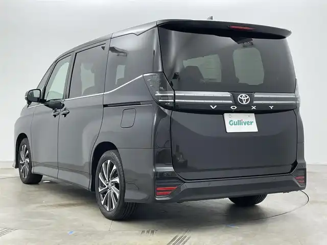 トヨタ ヴォクシー S－Z 岡山県 2022(令4)年 5.3万km グリッターブラックガラスフレーク 純正10.5インチディスプレイオーディオ/　【ナビ/DVD/BT/USB/Carplay/HDMI】/バックカメラ/両側パワースライドドア/追従型クルーズコントロール/オートハイビーム/LEDヘッドライト（AUTO機能付き）/ビルトインETC2.0/前席シートヒーター/衝突軽減ブレーキシステム/車線逸脱防止システム/横滑り防止装置/純正１７インチアルミ/コーナーセンサー（前後）/純正フロアマット/プッシュスタート/スマートキー×1/保証書/ナビ取扱説明書/取扱説明書