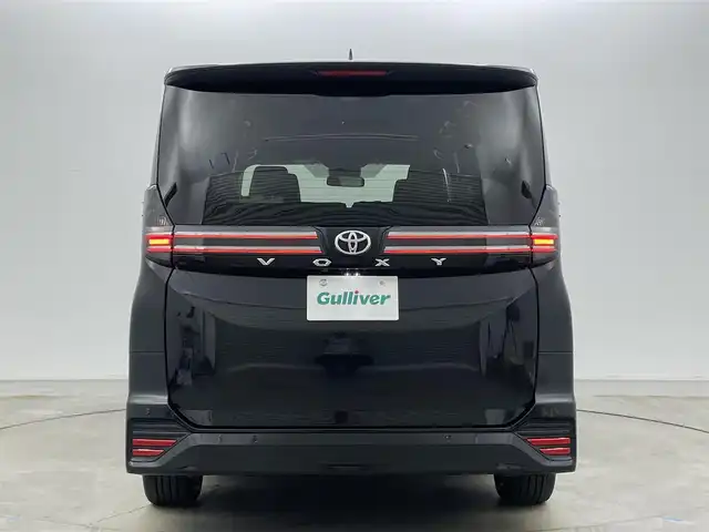 トヨタ ヴォクシー S－Z 岡山県 2022(令4)年 5.3万km グリッターブラックガラスフレーク 純正10.5インチディスプレイオーディオ/　【ナビ/DVD/BT/USB/Carplay/HDMI】/バックカメラ/両側パワースライドドア/追従型クルーズコントロール/オートハイビーム/LEDヘッドライト（AUTO機能付き）/ビルトインETC2.0/前席シートヒーター/衝突軽減ブレーキシステム/車線逸脱防止システム/横滑り防止装置/純正１７インチアルミ/コーナーセンサー（前後）/純正フロアマット/プッシュスタート/スマートキー×1/保証書/ナビ取扱説明書/取扱説明書