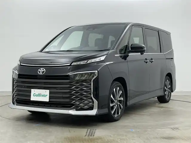 トヨタ ヴォクシー S－Z 岡山県 2022(令4)年 5.3万km グリッターブラックガラスフレーク 純正10.5インチディスプレイオーディオ/　【ナビ/DVD/BT/USB/Carplay/HDMI】/バックカメラ/両側パワースライドドア/追従型クルーズコントロール/オートハイビーム/LEDヘッドライト（AUTO機能付き）/ビルトインETC2.0/前席シートヒーター/衝突軽減ブレーキシステム/車線逸脱防止システム/横滑り防止装置/純正１７インチアルミ/コーナーセンサー（前後）/純正フロアマット/プッシュスタート/スマートキー×1/保証書/ナビ取扱説明書/取扱説明書