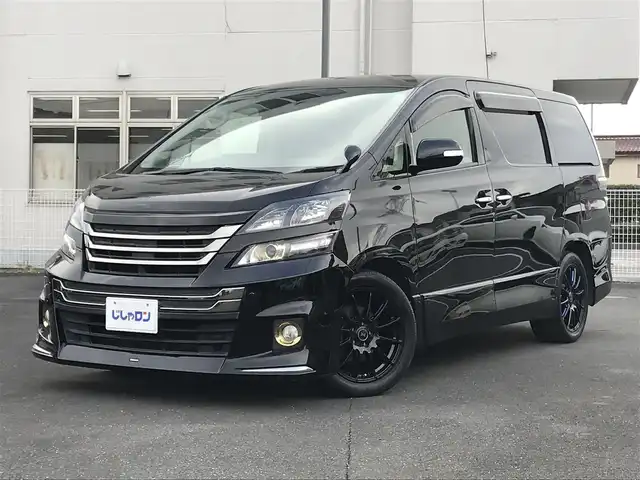 トヨタ ヴェルファイア 2．4Z ゴールデンアイズ 栃木県 2013(平25)年 14.4万km ブラック (株)IDOMが運営する【じしゃロン小山店】の自社ローン対象車両になります。こちらは現金ご利用時の価格です。/自社ローンご希望の方は別途その旨お申付け下さい。//禁煙車/純正フルセグナビ/（CD/DVD/AM/FMラジオ）/(Bluetooth)/スマートキー/プッシュスタート/バックカメラ/ＥＴＣ/クルーズコントロール/両側パワースライドドア/パワーバックドア/オットマン/システムコンソール/ステアリングリモコン/電動格納ドアミラー/パワーウインドウ/オートライト/自動防眩ミラー