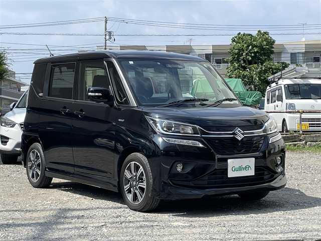スズキ ソリオ バンディット HV MV 東京都 2021(令3)年 1.9万km スーパーブラックパール 社外メモリナビ/ （DVD/フルセグTV/Bluetooth/MSV）/全方位モニター/ETC/両側パワースライドドア/D席シートヒーター/ステアマチック/・アダプティブクルーズコントロール/・デュアルカメラブレーキサポート/・先行車発進お知らせ機能/・交通標識認識機能/・誤発進抑制機能/・後方誤発進抑制機能/・ハイビームアシスト/・車線逸脱抑制機能/横滑り防止装置/純正15インチアルミホイール/純正LEDヘッドライト/スマートキー/取扱説明書