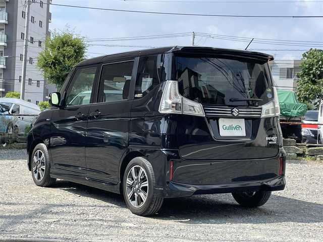 スズキ ソリオ バンディット HV MV 東京都 2021(令3)年 1.9万km スーパーブラックパール 社外メモリナビ/ （DVD/フルセグTV/Bluetooth/MSV）/全方位モニター/ETC/両側パワースライドドア/D席シートヒーター/ステアマチック/・アダプティブクルーズコントロール/・デュアルカメラブレーキサポート/・先行車発進お知らせ機能/・交通標識認識機能/・誤発進抑制機能/・後方誤発進抑制機能/・ハイビームアシスト/・車線逸脱抑制機能/横滑り防止装置/純正15インチアルミホイール/純正LEDヘッドライト/スマートキー/取扱説明書