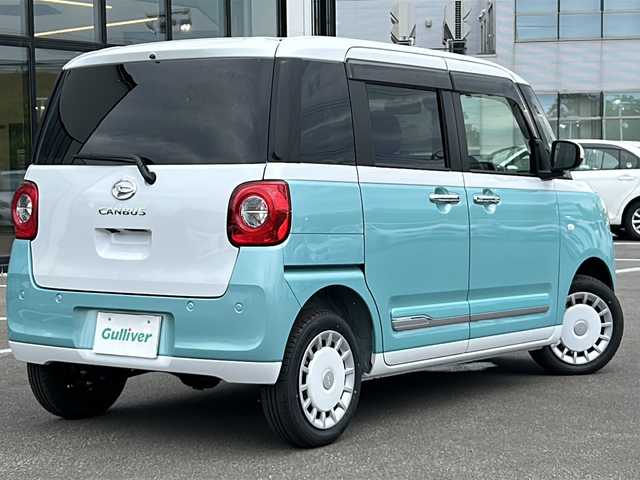 ダイハツ ムーヴ キャンバス ストライプス G 青森県 2024(令6)年 0.1千km シャイニングホワイトパール/ファインミントメタリック ・4WD/・ターボ/・純正ナビ/・フルセグＴＶ/・Bluetooth/・バックカメラ/・全方位カメラ/・純正エンジンスターター/・ＥＴＣ/・衝突被害軽減ブレーキ/・両側電動パワースライドドア/・ＬＥＤヘッドランプ/・フォグライト/・スマートキー/・プッシュスタート/・オートライト/・ホットカップホルダー/・純正フロアマット/・スペアキー有/・保証書・取説有