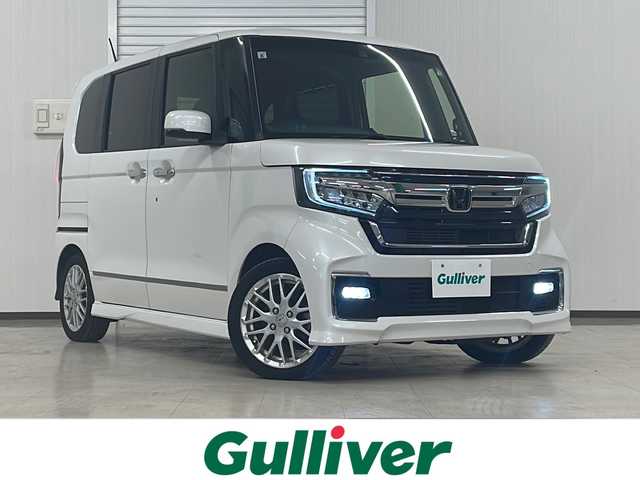 ホンダ Ｎ ＢＯＸ カスタム L ターボ 熊本県 2021(令3)年 6.5万km プラチナホワイトパール 社外メモリナビ（ＣＤ/ＤＶＤ/フルセグ/ラジオ）/バックカメラ/レーダークルーズコントロール/両側パワースライドドア/レーンキープアシスト/衝突軽減システム/横滑り防止装置/コーナーセンサー/オートライト/フォグランプ/ハーフレザーシート/サンシェード/純正フロアマット/ドアバイザー/純正15インチＡＷ
