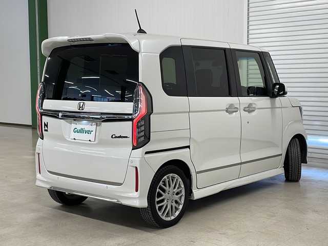 ホンダ Ｎ ＢＯＸ カスタム L ターボ 熊本県 2021(令3)年 6.5万km プラチナホワイトパール 社外メモリナビ（ＣＤ/ＤＶＤ/フルセグ/ラジオ）/バックカメラ/レーダークルーズコントロール/両側パワースライドドア/レーンキープアシスト/衝突軽減システム/横滑り防止装置/コーナーセンサー/オートライト/フォグランプ/ハーフレザーシート/サンシェード/純正フロアマット/ドアバイザー/純正15インチＡＷ