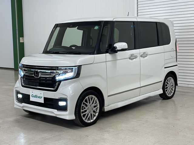 ホンダ Ｎ ＢＯＸ カスタム L ターボ 熊本県 2021(令3)年 6.5万km プラチナホワイトパール 社外メモリナビ（ＣＤ/ＤＶＤ/フルセグ/ラジオ）/バックカメラ/レーダークルーズコントロール/両側パワースライドドア/レーンキープアシスト/衝突軽減システム/横滑り防止装置/コーナーセンサー/オートライト/フォグランプ/ハーフレザーシート/サンシェード/純正フロアマット/ドアバイザー/純正15インチＡＷ