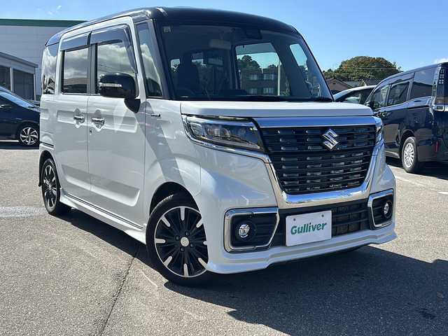 スズキ スペーシア カスタム HYBRID XS ターボ 石川県 2018(平30)年 9.1万km ピュアホワイトパール/ブラック2トーン 4WD/ワンオーナー/セーフティサポート/・デュアルセンサーブレーキサポート/・車線逸脱警報機能/・後退時ブレーキサポート/・リアパーキングセンサー/・誤発信抑制機能/・ふらつき警報機能/・ハイビームアシスト/純正SDメモリーナビゲーション/【CD・DVD・Bluetooth・フルセグTV】/型番：CN-RZ843/クルーズコントロール/両側パワースライドドア/前席シートヒーター/ビルトインETC/LEDヘッドライト/・オートライト/・フォグランプ/スマートキー/・プッシュスタート/・スペアキー/電動格納ミラー/・ウインカーミラー/革巻きステアリング/・パドルシフト/・ステアリングリモコン/アイドリングストップ/横滑り防止機能/純正フロアマット/取扱説明書/新車時保証書