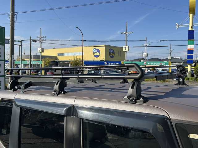 ホンダ Ｎ ＢＯＸ G SSパッケージ 静岡県 2013(平25)年 5万km アラバスターシルバーメタリック 純正ナビ/・ラジオ/USB/SD/VTR/ワンセグTV/主要装備/・ルーフキャリア　/・両側パワースライドドア　/・ステアリングリモコン　/・バックカメラ　/・アイドリングストップ　/・横滑り防止　/・プッシュスタート　/・スマートキー　/・ＥＴＣ　/・盗難防止装置　/・パワーステアリング/・純正アルミホイール/・純正フロアマット/・社外シートカバー