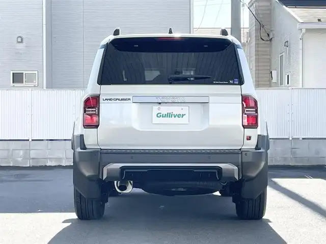 トヨタ ランドクルーザー ２５０ VX 栃木県 2024(令6)年 0.1万km プラチナホワイトパールマイカ モデリスタパッケージ/・フロントバンパーガード/・フロントアンダーカバー/・リヤバンパーガーニッシュ/トヨタチームメイト［アドバンスト ドライブ(渋滞時支援)］ /ToyotaSafetySense/・プリクラッシュセーフティ(歩行者［昼夜］・自転車運転者［昼夜］・自動二輪車［昼］検知機能付衝突回避支援タイプ/ミリ波レーダー+単眼カメラ方式)/・緊急時操舵支援(アクティブ操舵機能付)+フロントクロストラフィックアラート［FCTA］+レーンチェンジアシスト［LCA］/・レーントレーシングアシスト［LTA］+レーンディパーチャーアラート［LDA］/・レーダークルーズコントロール(全車速追従機能付)/・オートマチックハイビーム［AHB］/・プロアクティブドライビングアシスト［PDA］/ブラインドスポットモニター［BSM］+安心降車アシスト［SEA］+後方車両接近告知+周辺車両接近時サポート(通報提案機能)+後方車両への接近警報＋セカンダリーコリジョンブレーキ(停車中後突対応)/パノラミックビューモニター/12.3インチディスプレイオーディオ(コネクティッドナビ対応)Plus+トヨタプレミアムサウンドシステム/デジタルインナーミラー/ドライブレコーダー