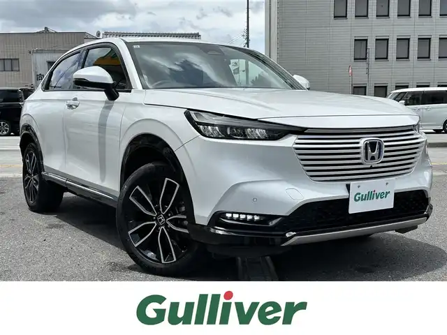 ホンダ ヴェゼル ハイブリッド e:HEV Z 三重県 2021(令3)年 4.5万km プラチナホワイトパール ♪ホンダセンシング♪/純正honda CONNECTディスプレイ/　・Bluetooth/　・フルセグTV/　・USB/マルチビューカメラシステム/アダプティブクルーズコントロール/ブラインドスポットモニター/クリアランスソナー/パワーバックドア/スマートキーx２本/プッシュスタート/ハーフレザーシート/D・N席シートヒーター/LEDヘッドライト/LEDフォグライト/ステアリングヒーター/パドルシフト/ステアリングスイッチ/ビルトインETC2.0/ドライブレコーダー(前後)/トノカバー/置くだけ充電/オートリトラクタブルミラー/ターンミラー/純正ラバーマット/横滑り防止