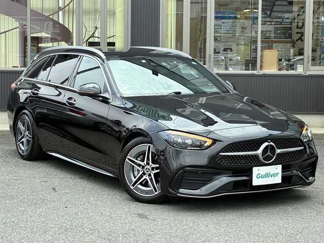 メルセデス・ベンツ Ｍ・ベンツ Ｃ２２０ｄ ステーションワゴン アバンギャルドAMGライン 京都府 2022(令4)年 1.2万km 黒Ｍ 登録時走行距離11683Km/パノラミックスライディングルーフ/レーダーセーフティパッケージ/・アクティブディスタンスA/・アクティブブレーキA/・プレセーフインパルスサイド/・アクティブブラインドスポットA/・アクティブレーンキープA/・アクティブステアリングA/・アクティブレーンチェンジA/・アクティブエマージェンシー ストップA/ユーザーエクスペリエンス/・11.9インチディスプレイ/・HDDナビ/・フルセグTV/・AppleCarPlay/AndroidAuto/・ETC2.0/360°カメラシステム/純正前後ドラレコ/アクティブパーキングA/レーザー×スエードコンビシート/・前席メモリー付パワーシート/・前席シートヒーター/レザーステアリング/・パドルシフト/キーレスゴー/・スマートキー×2個/アンビエントライト/LEDデジタルライト/純正スポーツサスペンション/純正18インチアルミホイール/車両取説/ユーザーエクスペリエンスクイックガイド