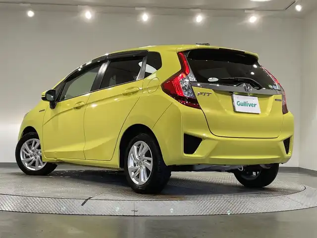 ホンダ フィット ハイブリット Lパッケージ 愛知県 2014(平26)年 8.2万km アトラクトイエローパール 純正ナビ/・AM/FM/CD/DVD/Bluetooth/・フルセグテレビ/衝突軽減ブレーキ/クルーズコントロール/バックカメラ/ETC/純正15インチアルミホイル/LEDヘッドライト/スマートキー/スペアキー/プッシュスタートボタン/オートライト/オートエアコン/電格ミラー/ドアバイザー/純正フロアマット/保証書/取扱説明書