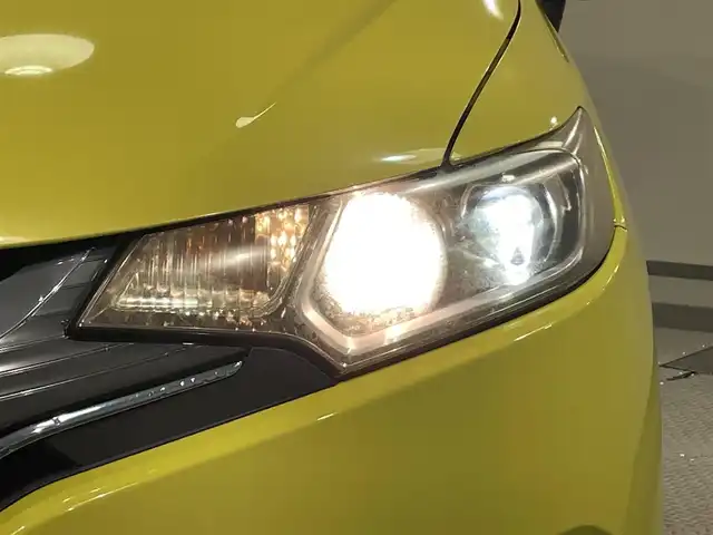 ホンダ フィット ハイブリット Lパッケージ 愛知県 2014(平26)年 8.2万km アトラクトイエローパール 純正ナビ/・AM/FM/CD/DVD/Bluetooth/・フルセグテレビ/衝突軽減ブレーキ/クルーズコントロール/バックカメラ/ETC/純正15インチアルミホイル/LEDヘッドライト/スマートキー/スペアキー/プッシュスタートボタン/オートライト/オートエアコン/電格ミラー/ドアバイザー/純正フロアマット/保証書/取扱説明書