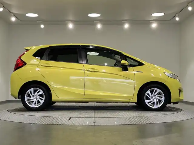 ホンダ フィット ハイブリット Lパッケージ 愛知県 2014(平26)年 8.2万km アトラクトイエローパール 純正ナビ/・AM/FM/CD/DVD/Bluetooth/・フルセグテレビ/衝突軽減ブレーキ/クルーズコントロール/バックカメラ/ETC/純正15インチアルミホイル/LEDヘッドライト/スマートキー/スペアキー/プッシュスタートボタン/オートライト/オートエアコン/電格ミラー/ドアバイザー/純正フロアマット/保証書/取扱説明書