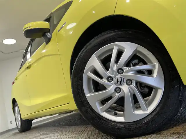 ホンダ フィット ハイブリット Lパッケージ 愛知県 2014(平26)年 8.2万km アトラクトイエローパール 純正ナビ/・AM/FM/CD/DVD/Bluetooth/・フルセグテレビ/衝突軽減ブレーキ/クルーズコントロール/バックカメラ/ETC/純正15インチアルミホイル/LEDヘッドライト/スマートキー/スペアキー/プッシュスタートボタン/オートライト/オートエアコン/電格ミラー/ドアバイザー/純正フロアマット/保証書/取扱説明書