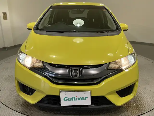 ホンダ フィット ハイブリット Lパッケージ 愛知県 2014(平26)年 8.2万km アトラクトイエローパール 純正ナビ/・AM/FM/CD/DVD/Bluetooth/・フルセグテレビ/衝突軽減ブレーキ/クルーズコントロール/バックカメラ/ETC/純正15インチアルミホイル/LEDヘッドライト/スマートキー/スペアキー/プッシュスタートボタン/オートライト/オートエアコン/電格ミラー/ドアバイザー/純正フロアマット/保証書/取扱説明書