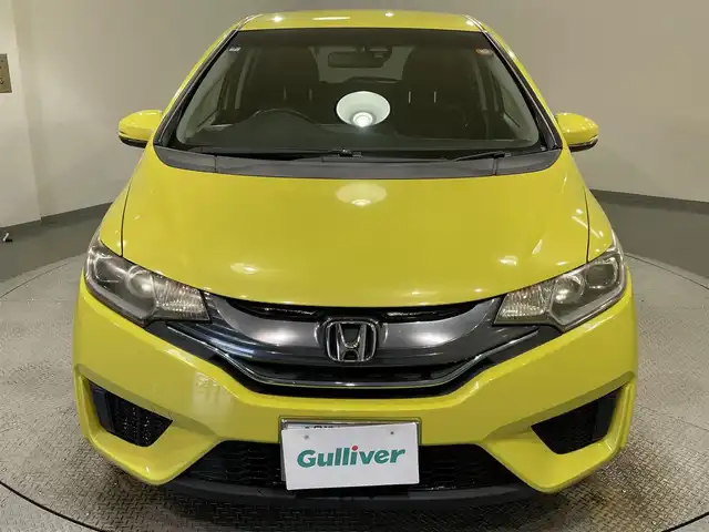 ホンダ フィット ハイブリット Lパッケージ 愛知県 2014(平26)年 8.2万km アトラクトイエローパール 純正ナビ/・AM/FM/CD/DVD/Bluetooth/・フルセグテレビ/衝突軽減ブレーキ/クルーズコントロール/バックカメラ/ETC/純正15インチアルミホイル/LEDヘッドライト/スマートキー/スペアキー/プッシュスタートボタン/オートライト/オートエアコン/電格ミラー/ドアバイザー/純正フロアマット/保証書/取扱説明書