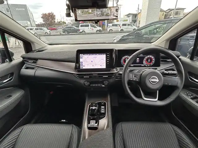 日産 オーラ G レザーエディション 埼玉県 2023(令5)年 0.2万km ガーネットレッド/スーパーブラック 2トーン ・ワンオーナー　/・純正フロント＆リアアンダースポイラー　/・純正ナビフルセグＴＶ　/・ナビ連動前後ドライブレコーダー　/・アラウンドビューモニター　/・デジタルインナーミラー　/・ＥＴＣ２．０　/・黒皮シート/・スマートキー×２/・プッシュスタート/・電子パーキング/・オートホールド　/・純正１７インチアルミ/・ブリジストンタイヤ/・オートライト/・LEDヘットライト/・LEDフォグライト/・保証書/・取説