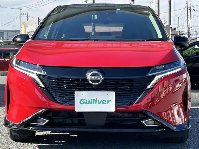 日産 オーラ G レザーエディション 埼玉県 2023(令5)年 0.2万km ガーネットレッド/スーパーブラック 2トーン ・ワンオーナー　/・純正フロント＆リアアンダースポイラー　/・純正ナビフルセグＴＶ　/・ナビ連動前後ドライブレコーダー　/・アラウンドビューモニター　/・デジタルインナーミラー　/・ＥＴＣ２．０　/・黒皮シート/・スマートキー×２/・プッシュスタート/・電子パーキング/・オートホールド　/・純正１７インチアルミ/・ブリジストンタイヤ/・オートライト/・LEDヘットライト/・LEDフォグライト/・保証書/・取説