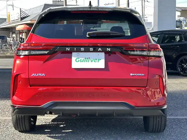 日産 オーラ G レザーエディション 埼玉県 2023(令5)年 0.2万km ガーネットレッド/スーパーブラック 2トーン ・ワンオーナー　/・純正フロント＆リアアンダースポイラー　/・純正ナビフルセグＴＶ　/・ナビ連動前後ドライブレコーダー　/・アラウンドビューモニター　/・デジタルインナーミラー　/・ＥＴＣ２．０　/・黒皮シート/・スマートキー×２/・プッシュスタート/・電子パーキング/・オートホールド　/・純正１７インチアルミ/・ブリジストンタイヤ/・オートライト/・LEDヘットライト/・LEDフォグライト/・保証書/・取説