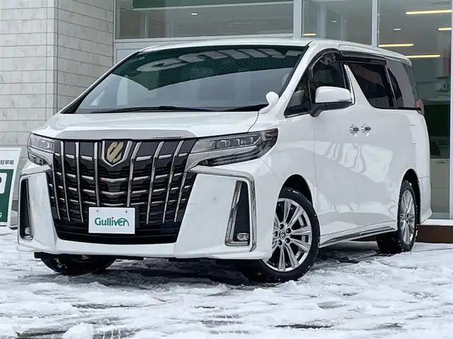 トヨタ アルファード S タイプゴールド 道央・札幌 2020(令2)年 7.8万km ホワイトパールクリスタルシャイン ・4WD/・寒冷地仕様/・トヨタ純正ディスプレイオーディオ/（CD/DVD/BＴ/TV/AM/FM/ナビ）/・バックカメラ/・純正フリップダウンモニター/・トヨタセーフティセンス/・プリクラッシュセーフティ/・レーントレーシングアシスト/・レーンディパーチャーアラート/・ロードサインアシスト/・レーダークルーズコントロール/・オートマチックハイビーム/・先行車発進アラーム/・コーナーセンサー/・SOSコール/・ビルトインETC/・社外前後ドライブレコーダー/・両側パワースライドドア/・ハーフレザーシート/・電動リアゲート/・純正18インチAW/・純正フロアマット/・プラスチックバイザー/・LEDヘッドライト/・フォグランプ/・リアフォグランプ/・プッシュスタート/・スマートキー/・電動パーキングブレーキ/・オートホールド