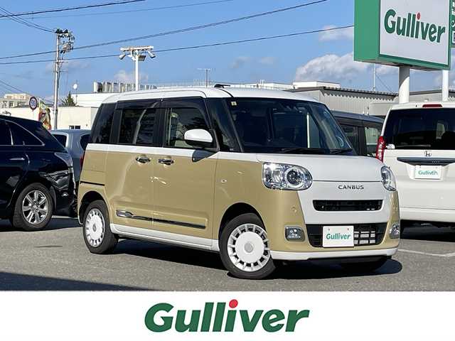 ダイハツ ムーヴ キャンバス ストライプス G ターボ 青森県 2023(令5)年 1.6万km シャイニングホワイトパール/サンドベージュメタリック 4WD/純正メモリナビ/フルセグTV/CD/DVD/BT/バックカメラ/前席シートヒーター/プッシュスタート/スマートキー/LEDヘッドライト/クルーズコントロール/プッシュスタート/両側パワースライドドア/保温機能付きカップホルダー