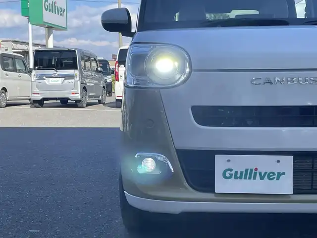 ダイハツ ムーヴ キャンバス ストライプス G ターボ 青森県 2023(令5)年 1.6万km シャイニングホワイトパール/サンドベージュメタリック 4WD/純正メモリナビ/フルセグTV/CD/DVD/BT/バックカメラ/前席シートヒーター/プッシュスタート/スマートキー/LEDヘッドライト/クルーズコントロール/プッシュスタート/両側パワースライドドア/保温機能付きカップホルダー