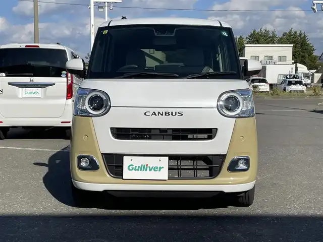 ダイハツ ムーヴ キャンバス ストライプス G ターボ 青森県 2023(令5)年 1.6万km シャイニングホワイトパール/サンドベージュメタリック 4WD/純正メモリナビ/フルセグTV/CD/DVD/BT/バックカメラ/前席シートヒーター/プッシュスタート/スマートキー/LEDヘッドライト/クルーズコントロール/プッシュスタート/両側パワースライドドア/保温機能付きカップホルダー