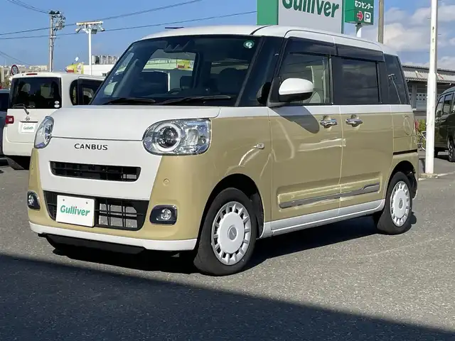 ダイハツ ムーヴ キャンバス ストライプス G ターボ 青森県 2023(令5)年 1.6万km シャイニングホワイトパール/サンドベージュメタリック 4WD/純正メモリナビ/フルセグTV/CD/DVD/BT/バックカメラ/前席シートヒーター/プッシュスタート/スマートキー/LEDヘッドライト/クルーズコントロール/プッシュスタート/両側パワースライドドア/保温機能付きカップホルダー