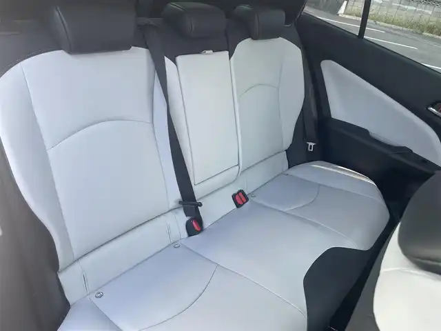 トヨタ プリウス A ツーリングセレクション 愛媛県 2019(平31)年 4.4万km スティールブロンドM 純正7型ナビ(AM/FM/CD/DVD/BT/ワンセグTV)/バックカメラ/白革温電動シート/トヨタセーフティセンス/レーダークルーズコントロール/ブラインドスポットモニター/ヘッドアップディスプレイ/衝突被害軽減装置/車線逸脱防止装置/パーキングアシスト/ヒートミラー/電格ミラー/純正ドアバイザー/ステアリングリモコン/後付けドリンクホルダー/PWR/NORMAL/ECO/トノカバー/現状サマー(純正AW)(215/45/R17)/PIRELLI P8FS