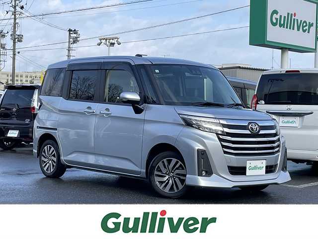 トヨタ ルーミー カスタムG 青森県 2020(令2)年 5.6万km ブライトシルバーM ４WD/純正ナビ/フルセグTV/CD/DVD/BT/衝突軽減ブレーキ/レーダークルーズコントロール/コーナーセンサー/ドライブレコーダー/ETC/両側パワースライドドア/全方位カメラ/電動パーキングブレーキ/オートホールド/電動格納ウインカーミラー/ドアバイザー/ステアリングスイッチ/14インチ純正AW/プッシュスタート/LEDオートライト/スマートキー×２
