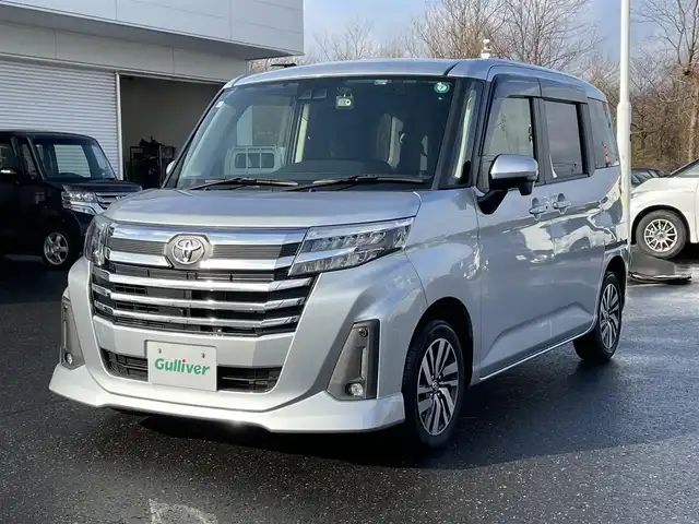 トヨタ ルーミー カスタムG 青森県 2020(令2)年 5.6万km ブライトシルバーM ４WD/純正ナビ/フルセグTV/CD/DVD/BT/衝突軽減ブレーキ/レーダークルーズコントロール/コーナーセンサー/ドライブレコーダー/ETC/両側パワースライドドア/全方位カメラ/電動パーキングブレーキ/オートホールド/電動格納ウインカーミラー/ドアバイザー/ステアリングスイッチ/14インチ純正AW/プッシュスタート/LEDオートライト/スマートキー×２
