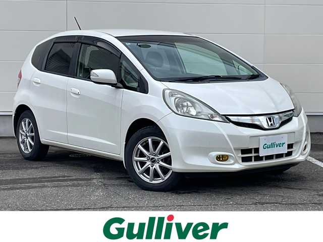 ホンダ フィット X 岩手県 2011(平23)年 7.5万km プレミアムホワイトパール 寒冷地仕様 ナビ ワンセグ クルーズコントロール ビルドインETC ステアリングスイッチ 電格ミラー ミラーヒーター シートヒーター エンジンスターター