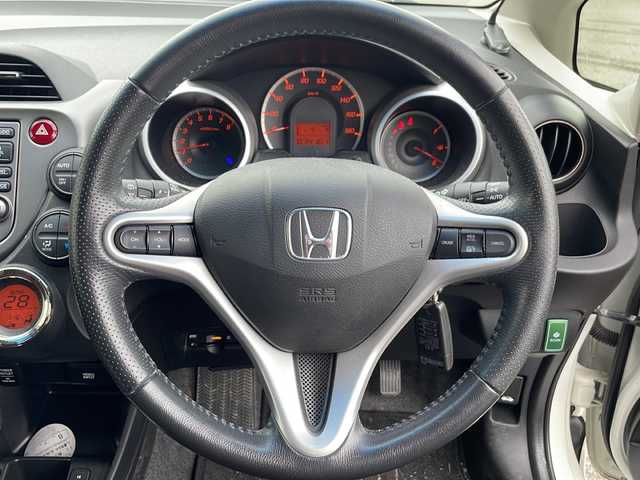 ホンダ フィット X 岩手県 2011(平23)年 7.5万km プレミアムホワイトパール 寒冷地仕様 ナビ ワンセグ クルーズコントロール ビルドインETC ステアリングスイッチ 電格ミラー ミラーヒーター シートヒーター エンジンスターター