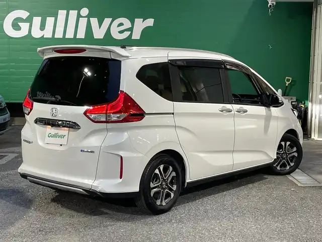ホンダ フリード＋ ハイブリット クロスター 東京都 2022(令4)年 3.9万km プラチナホワイトパール ワンオーナー/純正SDナビ【NMX-234VFi】/(DVD/フルセグTV/Bluetooth）/バックカメラ/ホンダセンシング/・アダクティブクルーズコントロール/・路外逸脱抑制機能/・誤発進抑制機能/・衝突軽減ブレーキ/ハーフレザーシート/前席シートヒーター/両側パワースライドドア/革ステアリング/LEDライト/アクティブコーナリングランプ/ETC/スペアキー×1/取扱説明書/保証書
