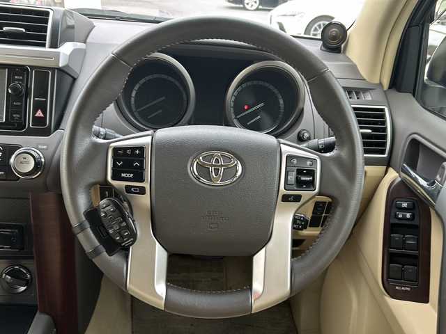 トヨタ ランドクルーザー プラド TX Lパッケージ 滋賀県 2014(平26)年 5.5万km ホワイトパールクリスタルシャイン ワンオーナー/純正SDナビ/フルセグテレビ（走行中視聴可）/電格ウィンカーミラー/クルーズコントロール/プッシュスタート/ETC/サンルーフ/AM/FM/CD/DVD/SD/D+N席シートヒーター/D+N席パワーシート/カロッツェリアカーオーディオ DEH-970 /レザーシート/純正フロアマット