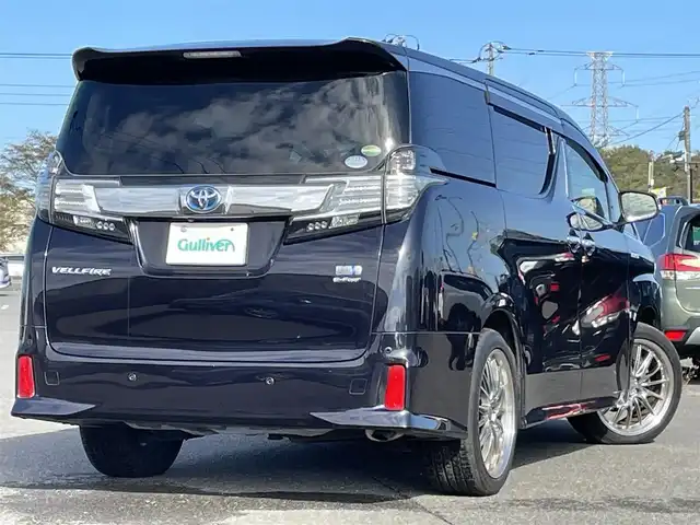 トヨタ ヴェルファイア ハイブリット ZR Gエディション 道央・札幌 2017(平29)年 9.2万km スパークリングブラックパールクリスタルシャイン ４WD/ワンオーナー/寒冷地仕様/純正ディーラーOPナビ/CD/DVD/BT/フルセグ/純正フリップダウンモニター/横滑り防止装置/クルーズコントロール/クリアランスソナー/バックカメラ/ビルトインETC/ドライブレコーダー/ワイパーデアイサー/EVMODE/ECOMODE/ツインサンルーフ/両側パワースライドドア/パワーバックドア/前席/２列目パワーシート/D席メモリーシート/前席シートヒーター/N席/２列目オットマン/レザーシート/革巻きステアリング/ステアリングリモコン/ハンドルヒーター/AC100V/電動パーキング/ブレーキホールド/MTモード付AT/自動防眩ミラー/プッシュスタート/純正リモートスタート/スマートキー/LEDヘッドライト/オートライト/オートハイビーム/フォグランプ/電動格納ミラー/ウィンカーミラー/純正フロアマット/ドアバイザー/スペアキー