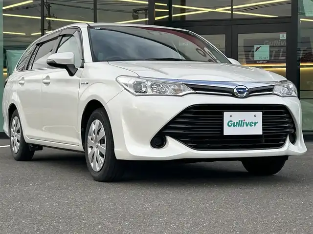 トヨタ カローラ フィールダー ハイブリッドG 鹿児島県 2015(平27)年 6.9万km ホワイトパールクリスタルシャイン Toyota Safety Sense C/純正ナビ/　　CD/DVD/BT/フルセグ/バックカメラ/クルーズコントロール/オートライト/布シート/ステアリングスイッチ/アイドリングストップ/スマートキー/ETC