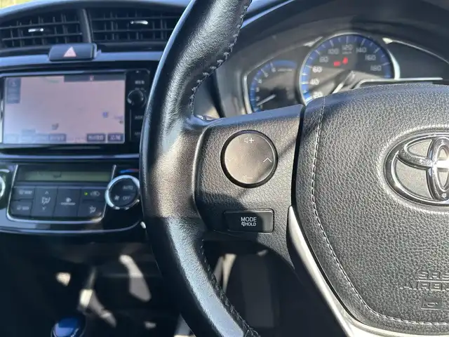 トヨタ カローラ フィールダー ハイブリッドG 鹿児島県 2015(平27)年 6.9万km ホワイトパールクリスタルシャイン Toyota Safety Sense C/純正ナビ/　　CD/DVD/BT/フルセグ/バックカメラ/クルーズコントロール/オートライト/布シート/ステアリングスイッチ/アイドリングストップ/スマートキー/ETC