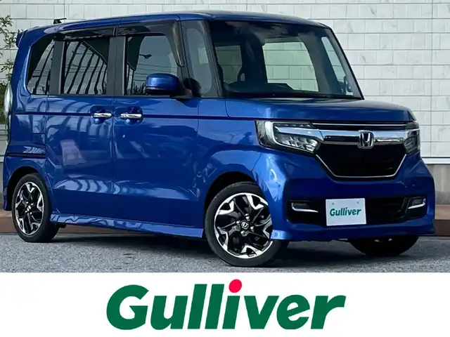 ホンダ Ｎ ＢＯＸ カスタム G EX ターボ ホンダセンシング 滋賀県 2018(平30)年 5.4万km ブリリアントスポーティブルーメタリック2トーン 純正8インチナビ(VXU-185NBi)/(AM/FM/CD/DVD/BT/フルセグTV)/バックカメラ/ビルトインETC/両側パワースライドドア/ホンダセンシング/・衝突軽減ブレーキ/・レーントレーシングアシスト/・レーダークルーズコントロール/横滑り防止装置/革巻きステアリング/ステアリングスイッチ/パドルシフト/オートライト/純正フロアマット/電格ウインカーミラー