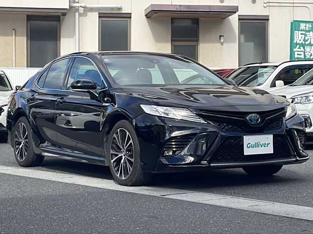トヨタ カムリ WS 岡山県 2019(令1)年 13.6万km アティチュードブラックマイカ 登録時走行距離135230km/純正ナビ/(AM/FM/BT/TV/DISC)/ToyotaSeaftySense/・プリクラッシュセーフティ/・アダプティブクルーズコントロール/・レーントレーシングアシスト/・オートマティックハイビーム/バックカメラ/ビルトインETC/BSM/HUD/ハーフレザーシート/D席パワーシート/スマートキー/スペアキー/純正18インチアルミホイール